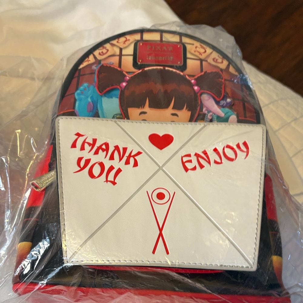 Monsters Inc Boo Backpack with Red and Black Design